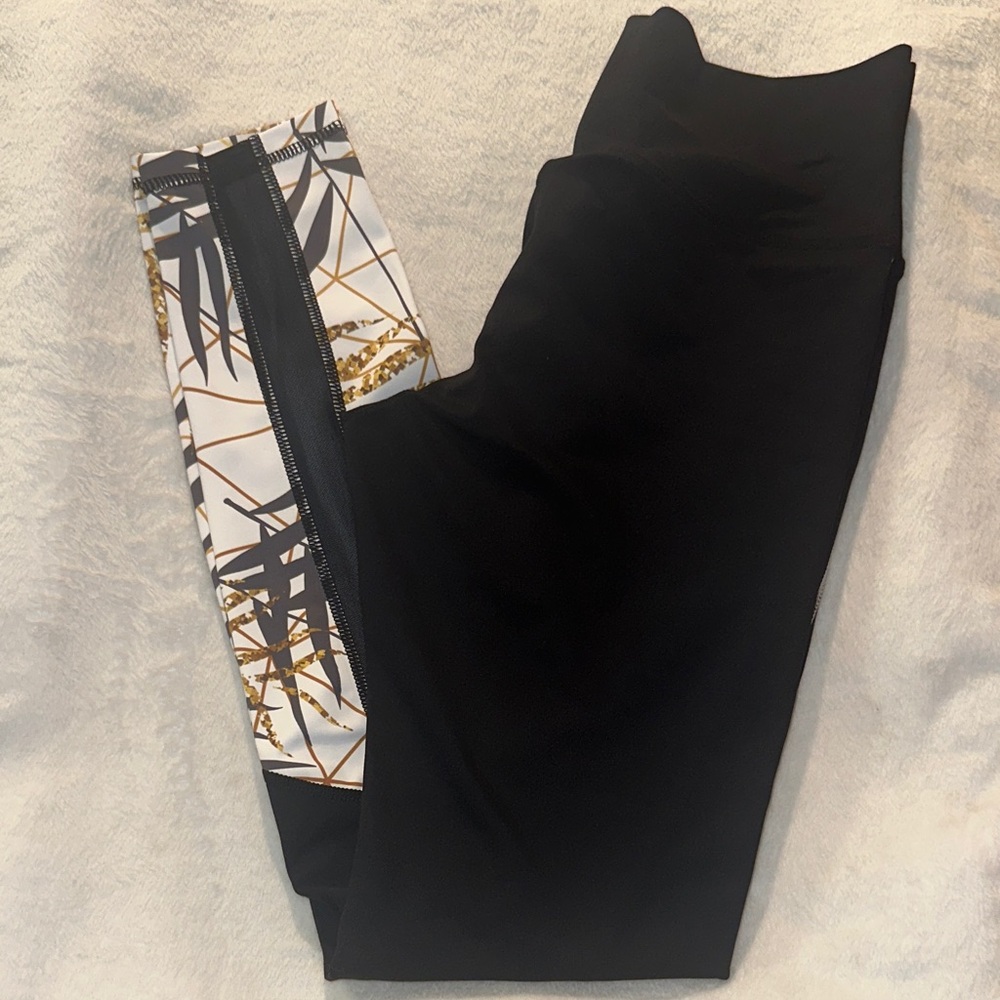 Elegant Black Leggings with Gold and White Pattern